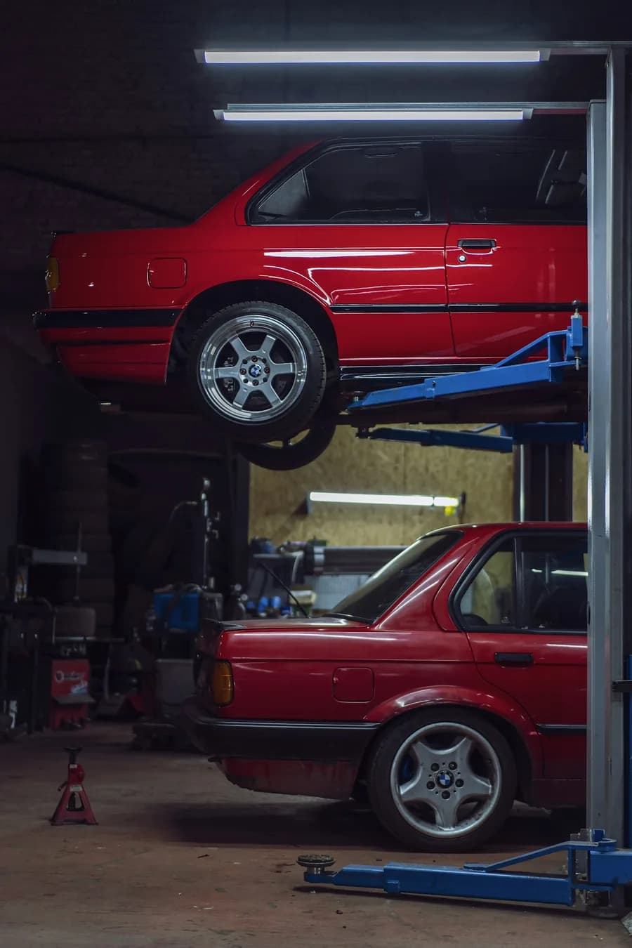 Cars up on lifts in a tuning workshop